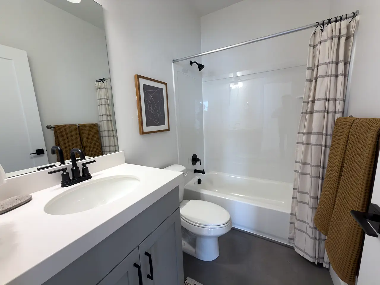Basement Bathroom with a standard vanity