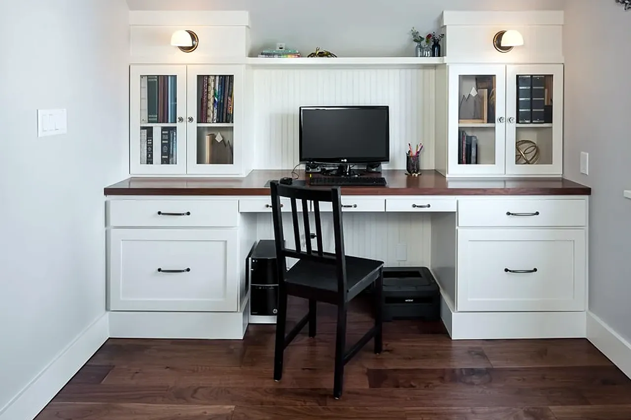 09221170 Small basement home office with with cabinets